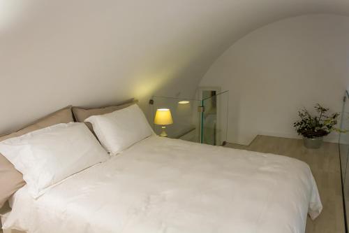 Postel nebo postele na pokoji v ubytování La Rosa del Corso