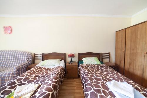 Ein Bett oder Betten in einem Zimmer der Unterkunft Hotel Vardzia K A L A