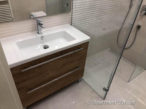 Bilik mandi di VILA Mojca APARTMA PERIDOT - Center Kranjska Gora