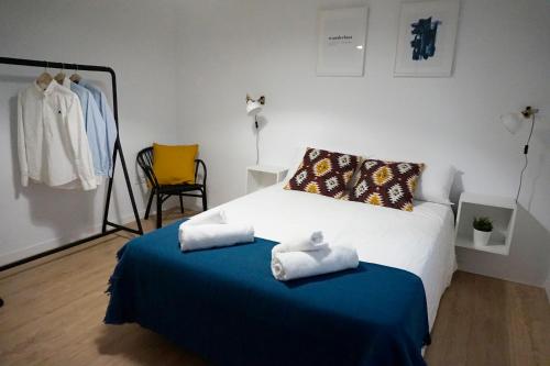 Ένα ή περισσότερα κρεβάτια σε δωμάτιο στο Ronda Chic Apartments - C/ Lauria - Centro ciudad