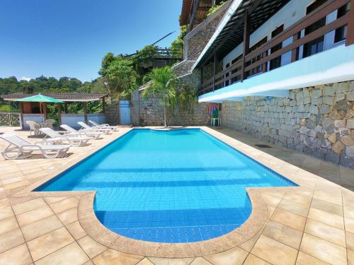 The swimming pool at or close to Pousada Ponta do Leste