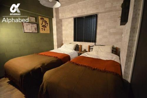 Postelja oz. postelje v sobi nastanitve Alphabed SunportTakamatsu 702 / Vacation STAY 21868