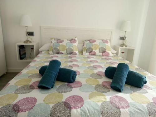 Posteľ alebo postele v izbe v ubytovaní el apartamento junto al mar