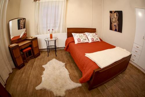 מיטה או מיטות בחדר ב-Forest Park Villa
