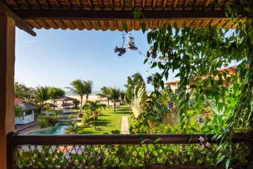 a view from the balcony of a resort at Pousada Mi Secreto in São Miguel do Gostoso