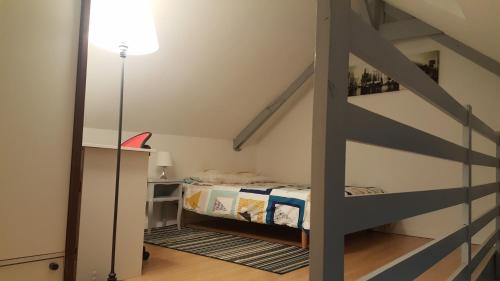 Postel nebo postele na pokoji v ubytování Joli Duplex Gare - Centre Ville Rennes