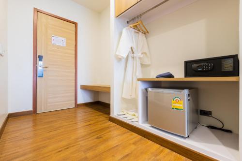 Кухня или мини-кухня в Icon Park Hotel, Chiang Mai- SHA Extra Plus

