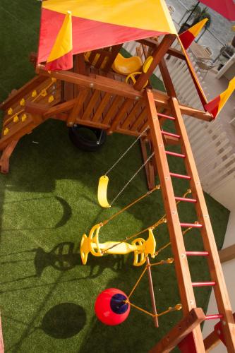 an overhead view of a playground with a play equipment at MarySol Las Palmas in Rincon de Guayabitos