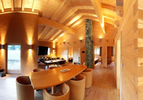 a dining room with a table and some chairs at Gasthaus-Pension Reiterklause in Leutasch