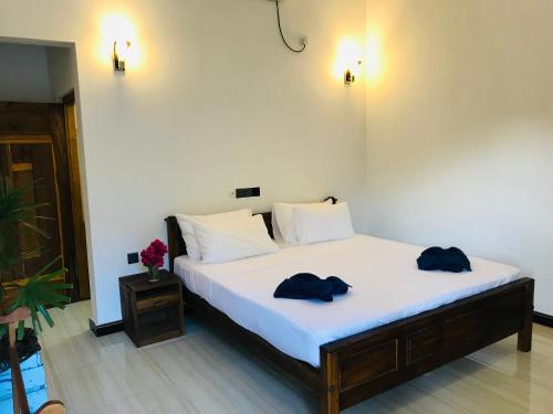 
Ein Bett oder Betten in einem Zimmer der Unterkunft Oasis Bay
