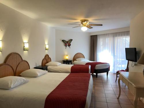 En eller flere senger på et rom på Hotel Bellerive