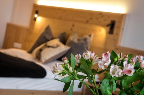 Postel nebo postele na pokoji v ubytování Hotel Moritz