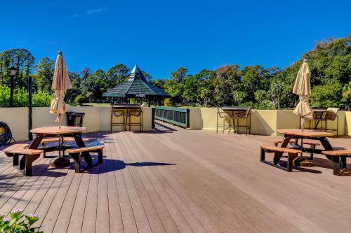 a group of tables and umbrellas on a patio at Evian 154 in Hilton Head Island