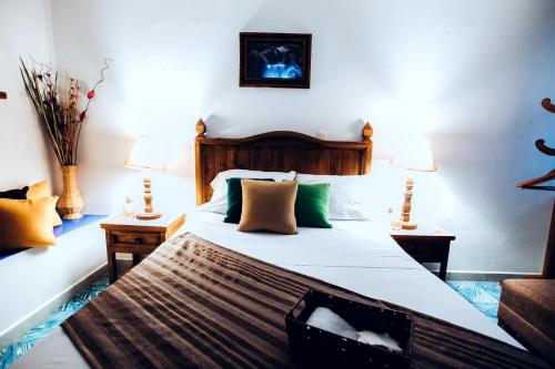 Katil atau katil-katil dalam bilik di Hostal Plaza Central