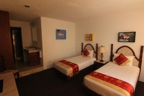 Postel nebo postele na pokoji v ubytování Mansion Havre