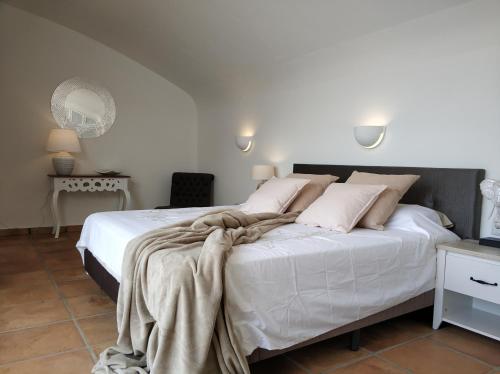 Voodi või voodid majutusasutuse Villa Paola toas