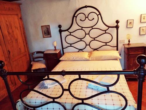 Ένα ή περισσότερα κρεβάτια σε δωμάτιο στο Agriturismo Borgo Ornina