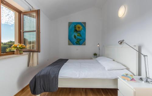 Postel nebo postele na pokoji v ubytování Villas Adagio