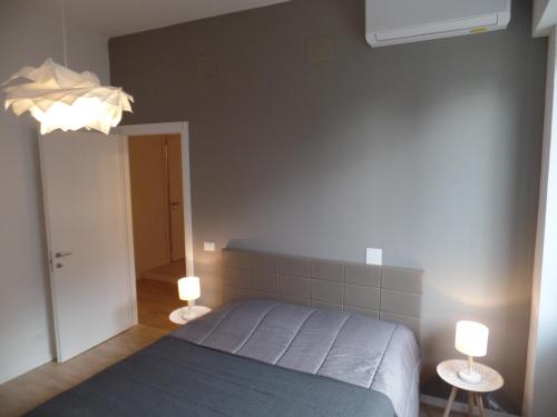 Postel nebo postele na pokoji v ubytování Residenza Vittorio Emanuele