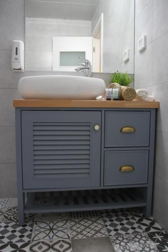 a bathroom with a sink and a tub at LAMITA in Majdal Shams