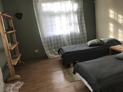 Katil atau katil-katil dalam bilik di Rožkalni