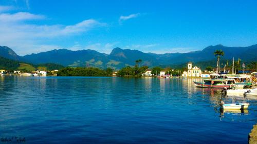 a large body of water with boats in it at Casa Turquesa - Maison D´Hôtes in Paraty