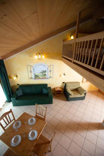 Гостиная зона в La Grolla Rooms & Apartments