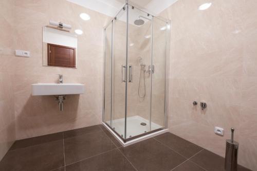 Ванная комната в Rezidence Moser Apartments