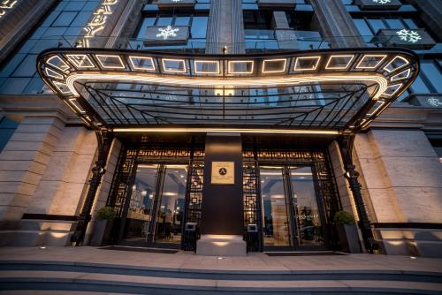 a facade of a building with glass doors at Aghababyan's Hotel in Yerevan