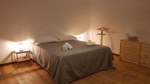 Ліжко або ліжка в номері La Casetta di Rosetta