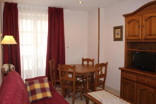 Μια τηλεόραση ή/και κέντρο ψυχαγωγίας στο Apartamentos La Lula