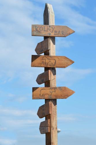 a wooden sign that says jobs bar on it at BIO Farma & Penzión Zlatý Hýľ in Nováčany