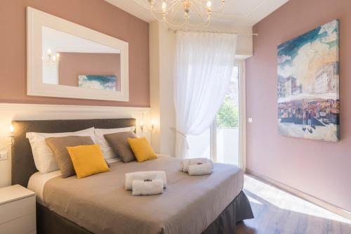 Katil atau katil-katil dalam bilik di Trastevere Gallery Suites