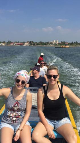 a group of people on a boat in the water at Nallur Residence in Jaffna