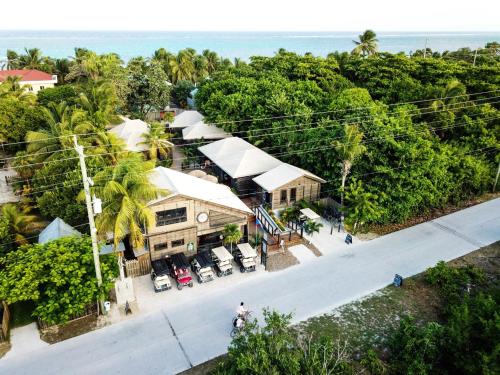 an overhead view of a house with the ocean in the background at PUR Boutique Cabanas, Adults Only in San Pedro