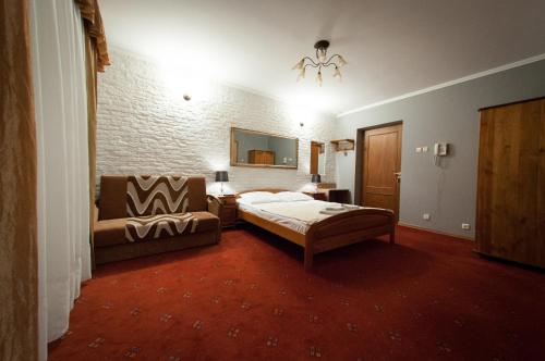 מיטה או מיטות בחדר ב-Secession Hotel