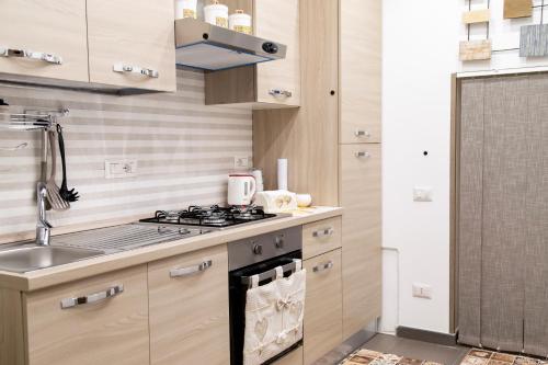 Kuchyň nebo kuchyňský kout v ubytování First House Posillipo