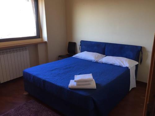 Letto o letti in una camera di Hotel Le Tre Stazioni