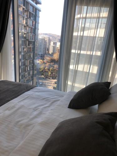 Postel nebo postele na pokoji v ubytování Apartment Tbilisi in King David