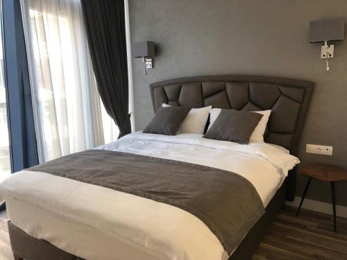 Postel nebo postele na pokoji v ubytování Apartment Tbilisi in King David