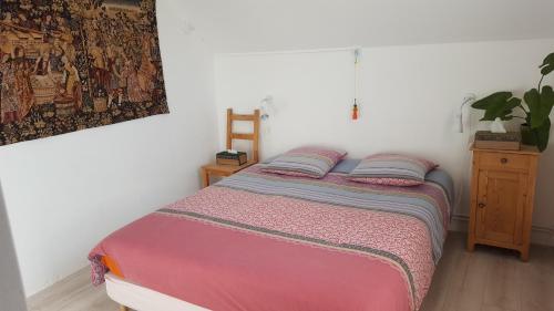 Cama o camas de una habitación en Au Soleil Joyeux