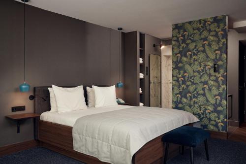 Postel nebo postele na pokoji v ubytování Van der Valk Hotel Eindhoven