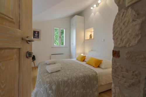 Posteľ alebo postele v izbe v ubytovaní Vacation house "Kaštil" Pučišća - Brač