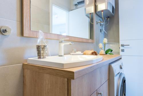 Kúpeľňa v ubytovaní Apartment Portolan