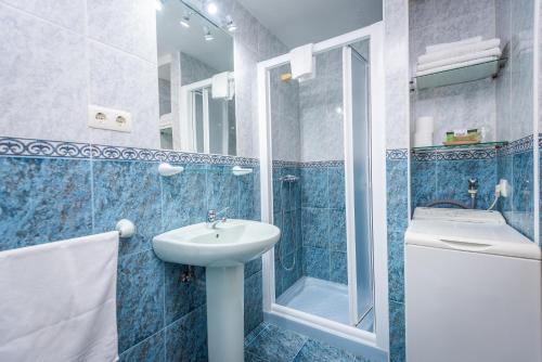 Ένα μπάνιο στο Apartamentos Cudillero