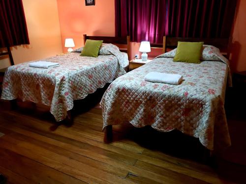 Una cama o camas en una habitación de La Nuit home