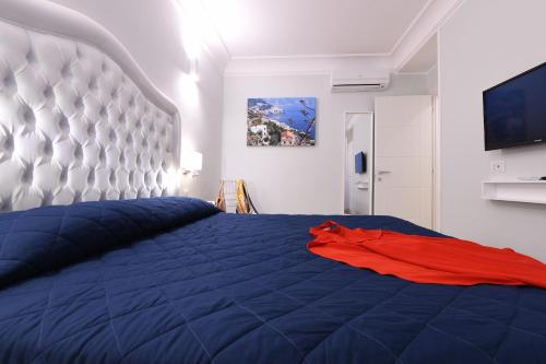 Krevet ili kreveti u jedinici u objektu Angela House Amalfi centro