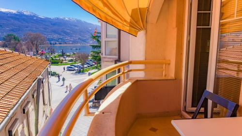 a view from a balcony of a balcony overlooking the ocean at Di Angolo Apartments in Ohrid
