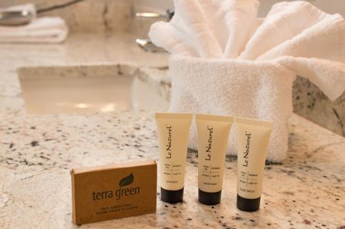 two tubes of terre oxygen sitting on a bathroom counter at Atrium 304 in Breckenridge