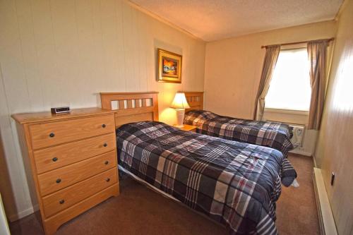 Postel nebo postele na pokoji v ubytování Severn I 208